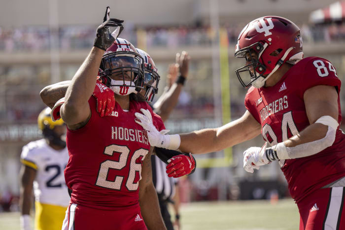 Indiana Hoosiers running back Josh Henderson (26) celebrates his touchdown during the first quarter against the Michigan Wolverines at Memorial Stadium.